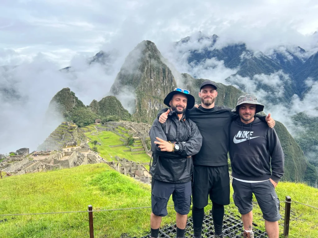 Machu Picchu sunrise Peru with clouds and ancient Inca ruins