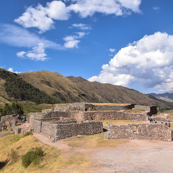 Ancient stone walls and terraces at Puka Pukara archaeological site near Cusco, Peru.