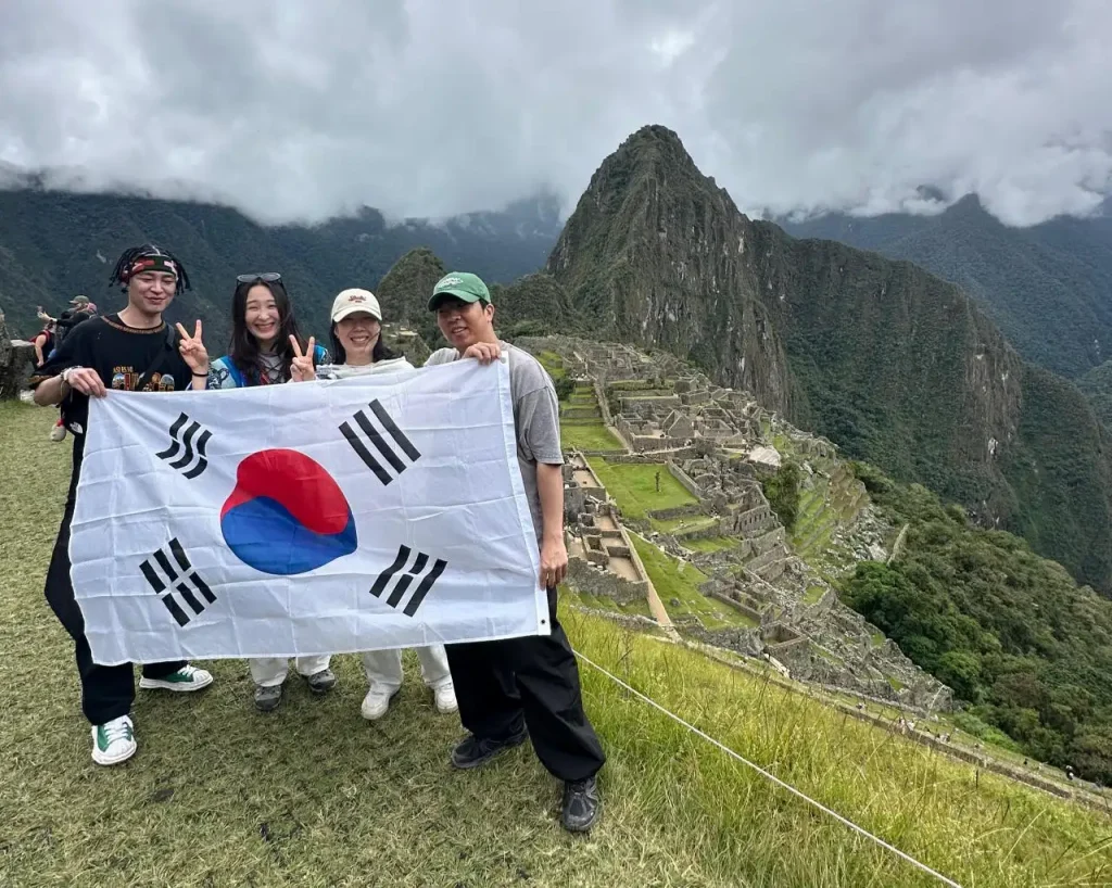 Korean travelers visiting Machu Picchu with Machupicchu Inka in Cusco Peru