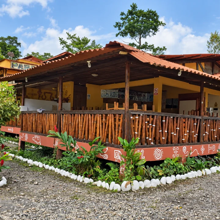 Welcoming lodge surrounded by tropical vegetation in Manu.