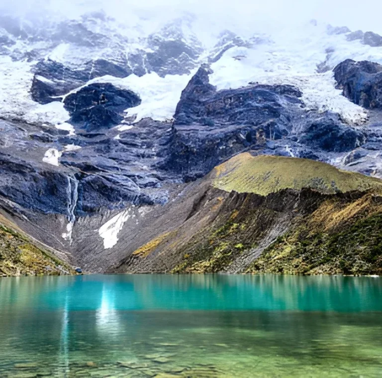 Humantay Lake Cusco Peru with turquoise water and snow mountain background