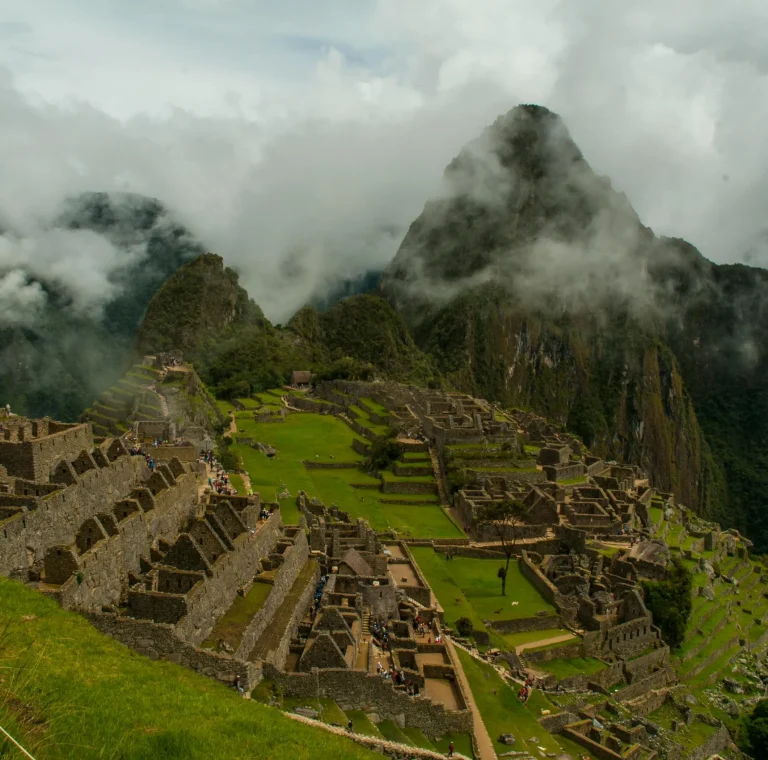 Machu Picchu sunrise Peru with mountains and ancient ruins