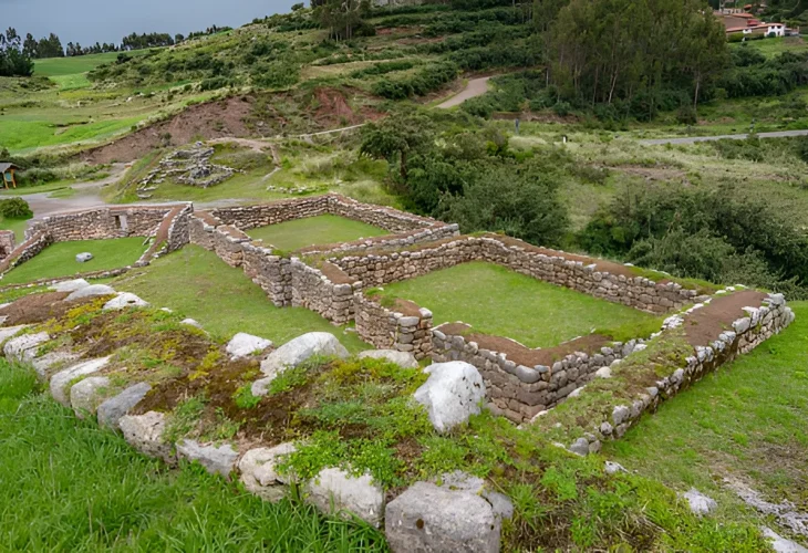 Puca Pucara fortress Cusco Peru red stone ruins with Andean landscape views