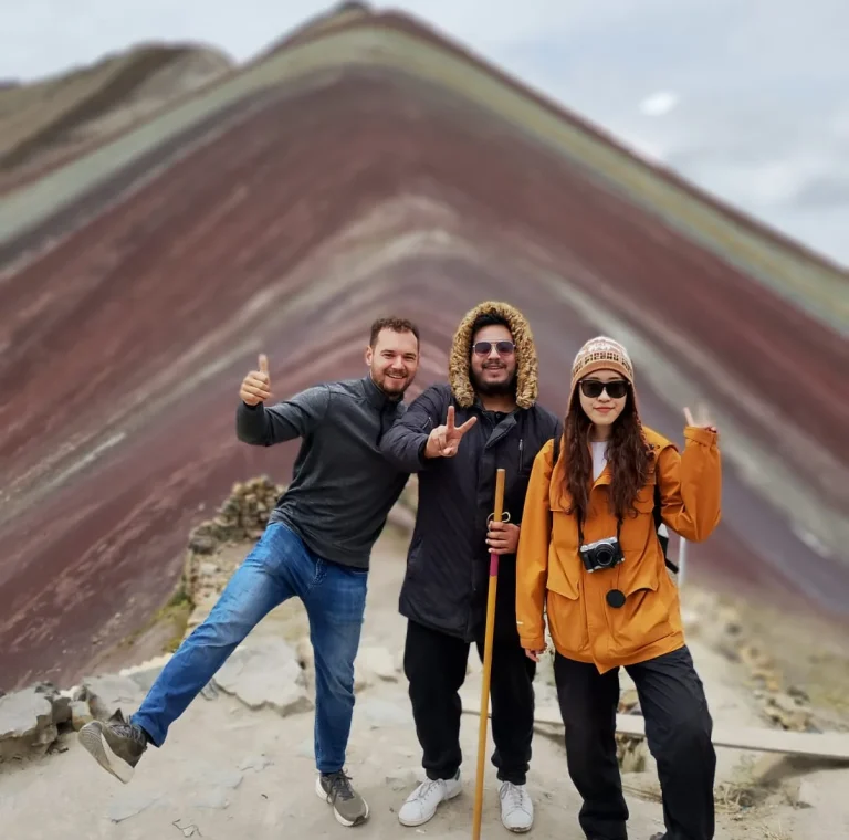 Hikers trekking to Rainbow Mountain Cusco Peru high altitude adventure