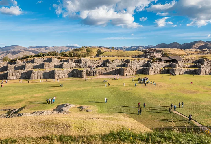 Sacsayhuaman ruins Cusco City Tour Peru with massive Inca stone walls and Andean landscape